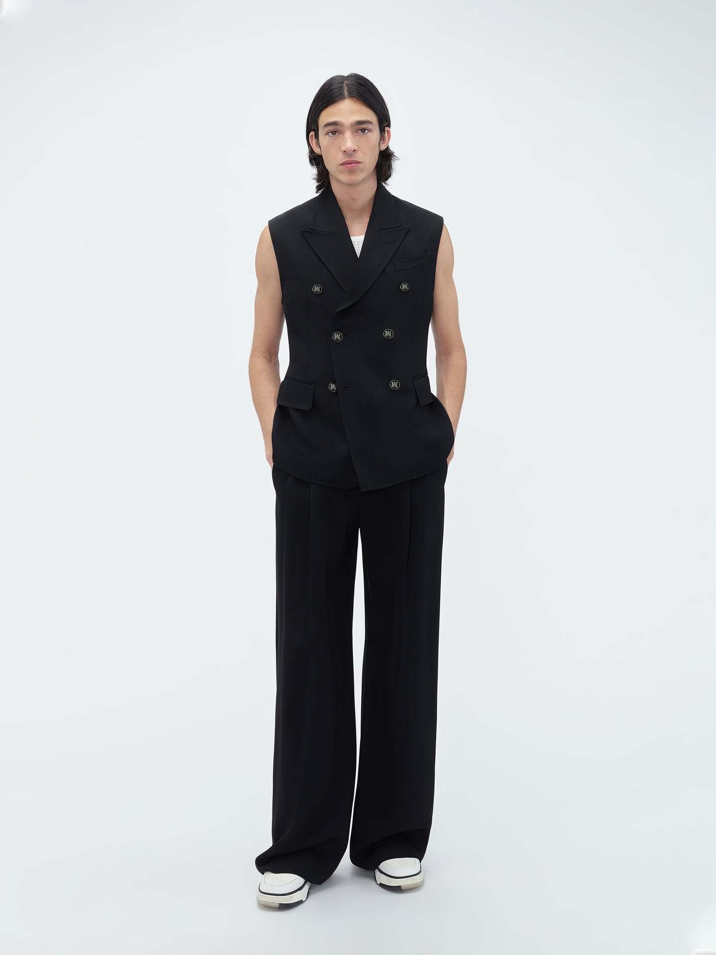 AMIRI AMIRI LOGO PATCH TAPERED LEG TROUSERS