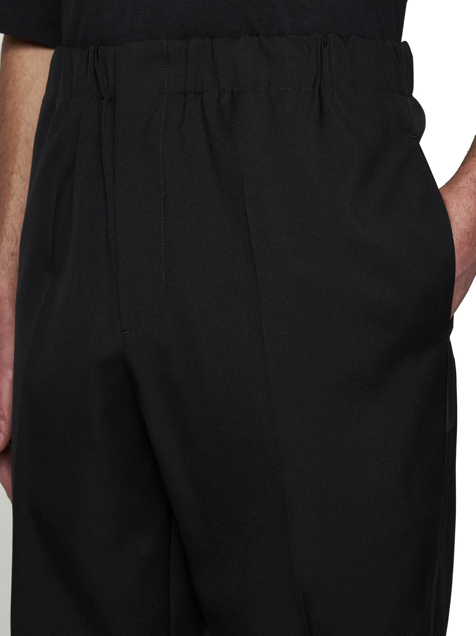 Jil Sander Elasticated-waist Tapered Trousers In Black