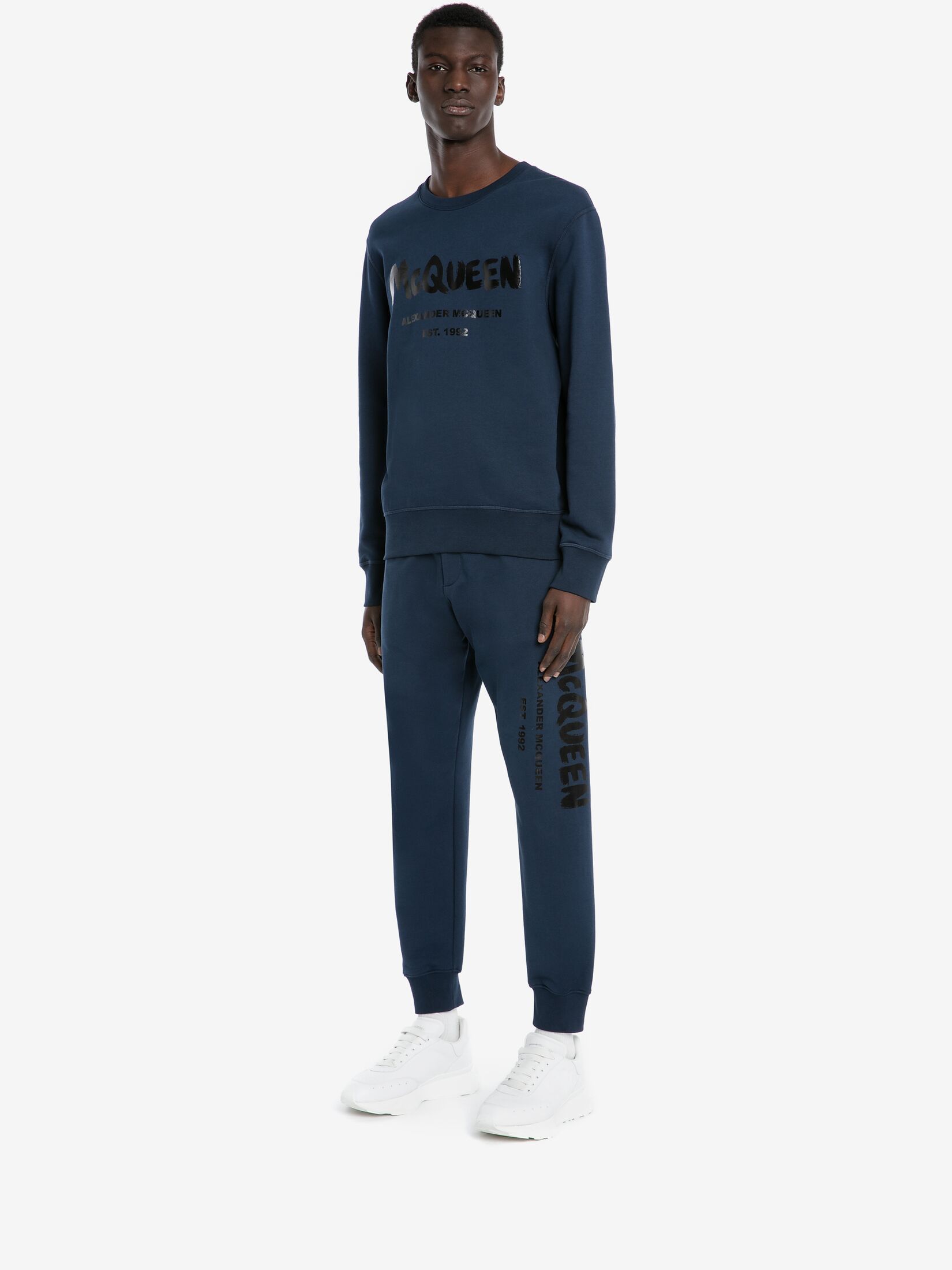 Alexander Mcqueen Graffiti Logo-print Track Pants In Blue
