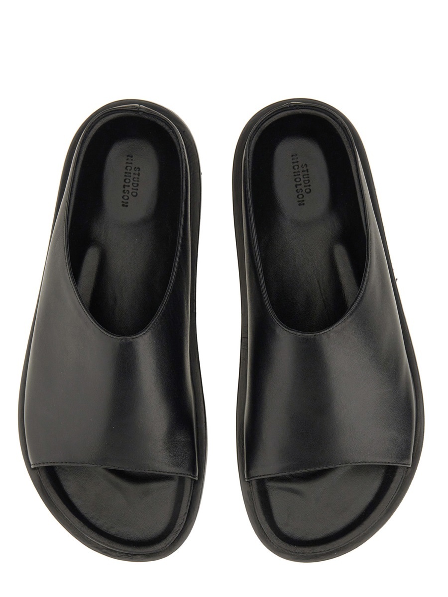 Studio Nicholson Minimalist Slide Flat Shoes In Black