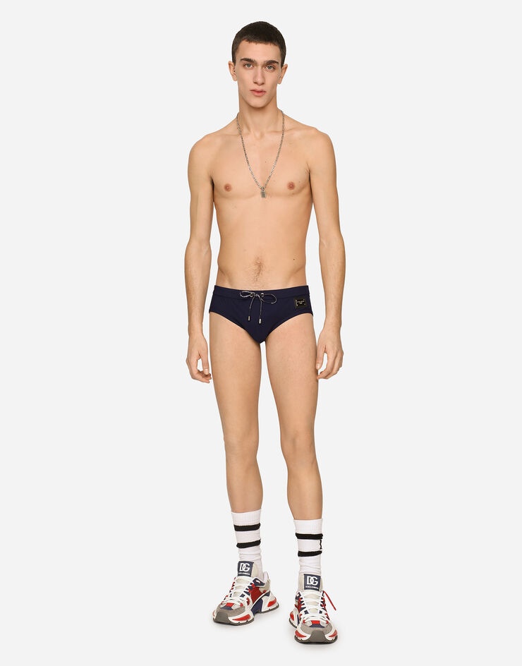 Dolce & Gabbana Swim Briefs With High-cut Leg And Branded Plate In Black