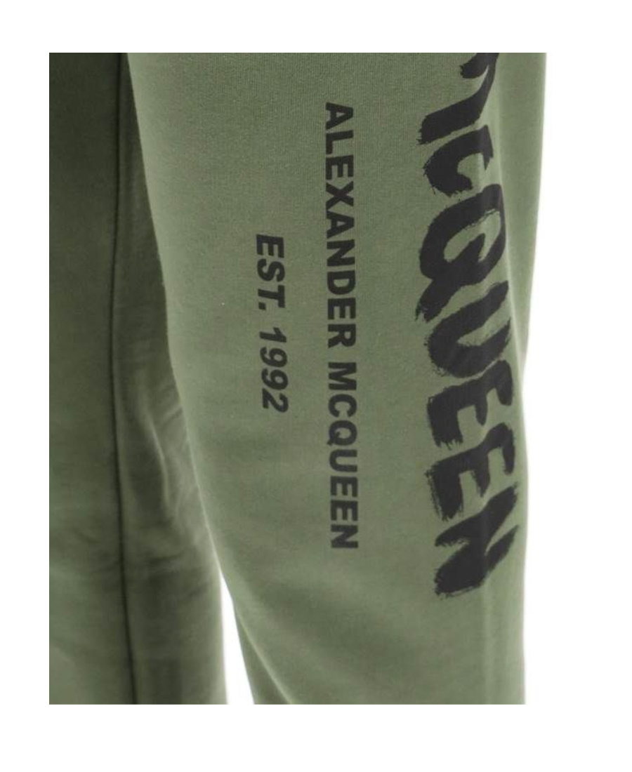 Alexander Mcqueen Logo Print Tapered Track Trousers In Green