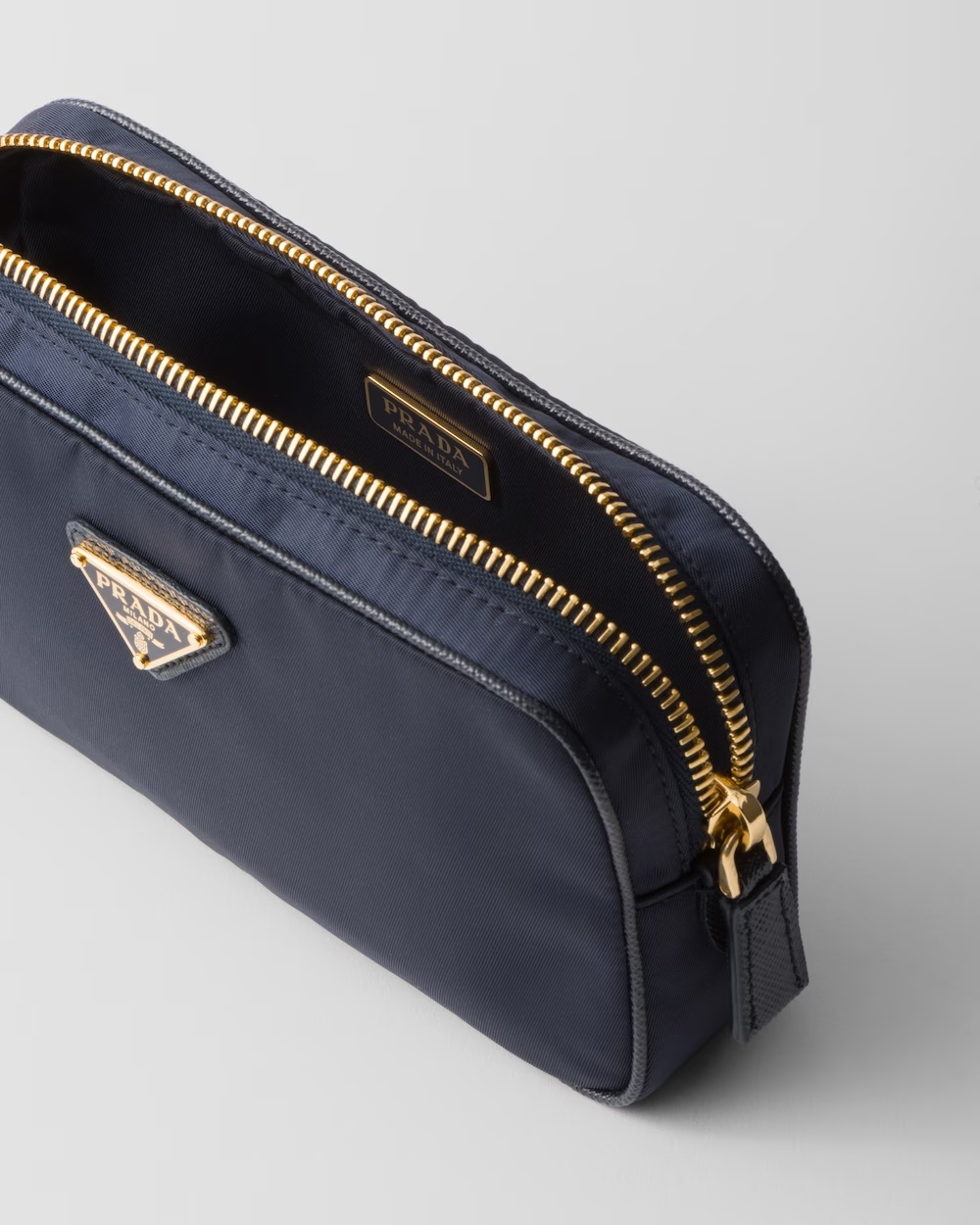 Prada Re-edition 1978 Zipper Clutch In Blue