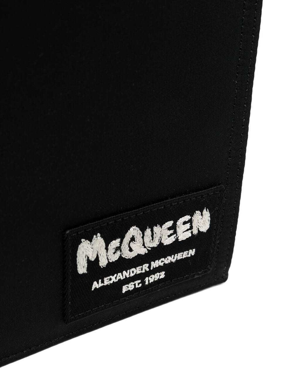 Alexander Mcqueen Logo-patch Messenger Bag In Black
