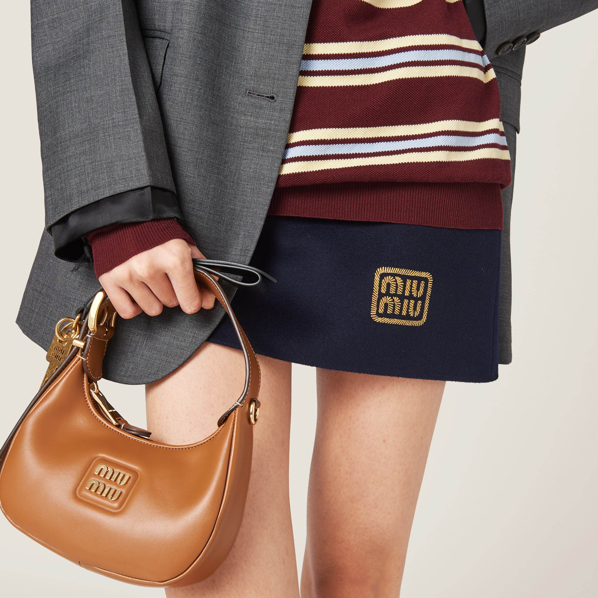 Miu Miu Woolen Skirt With Front Logo In Blue