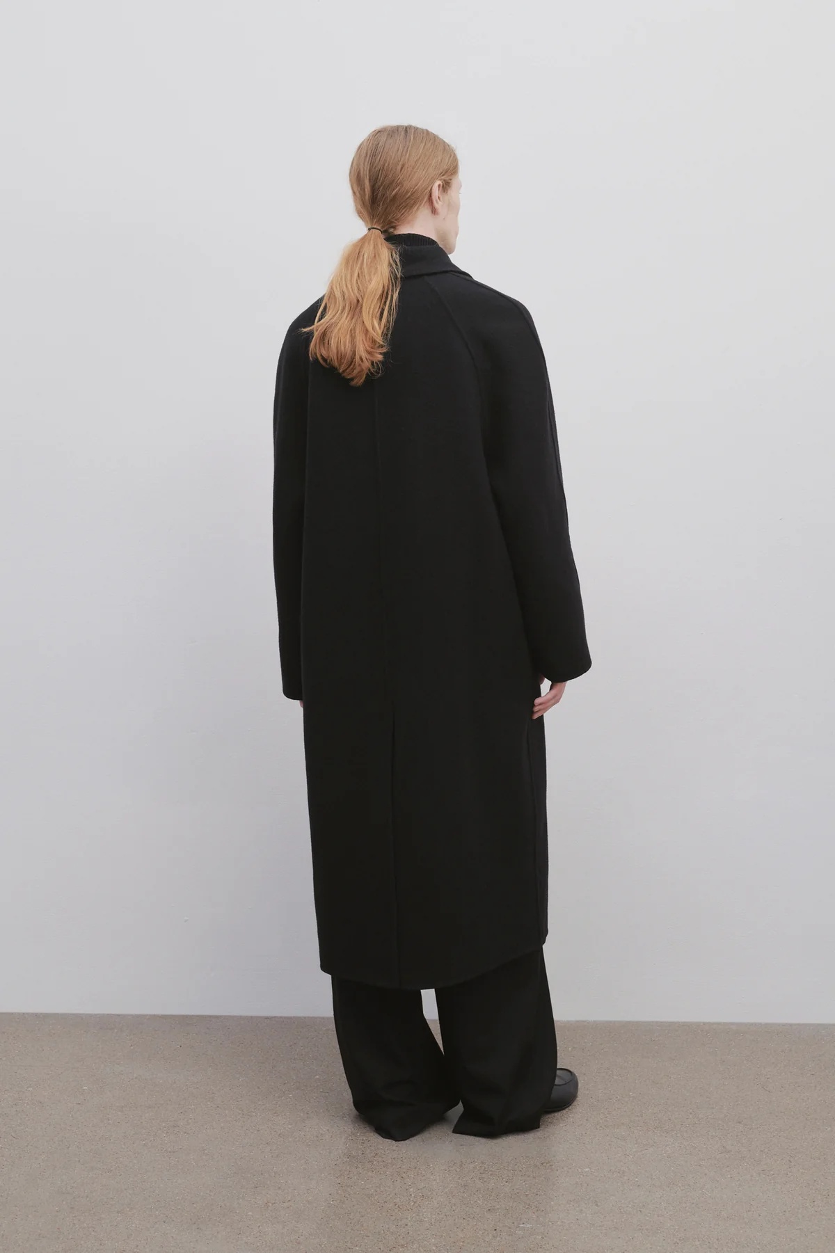 The Row Double-breasted Wool Coat In Black
