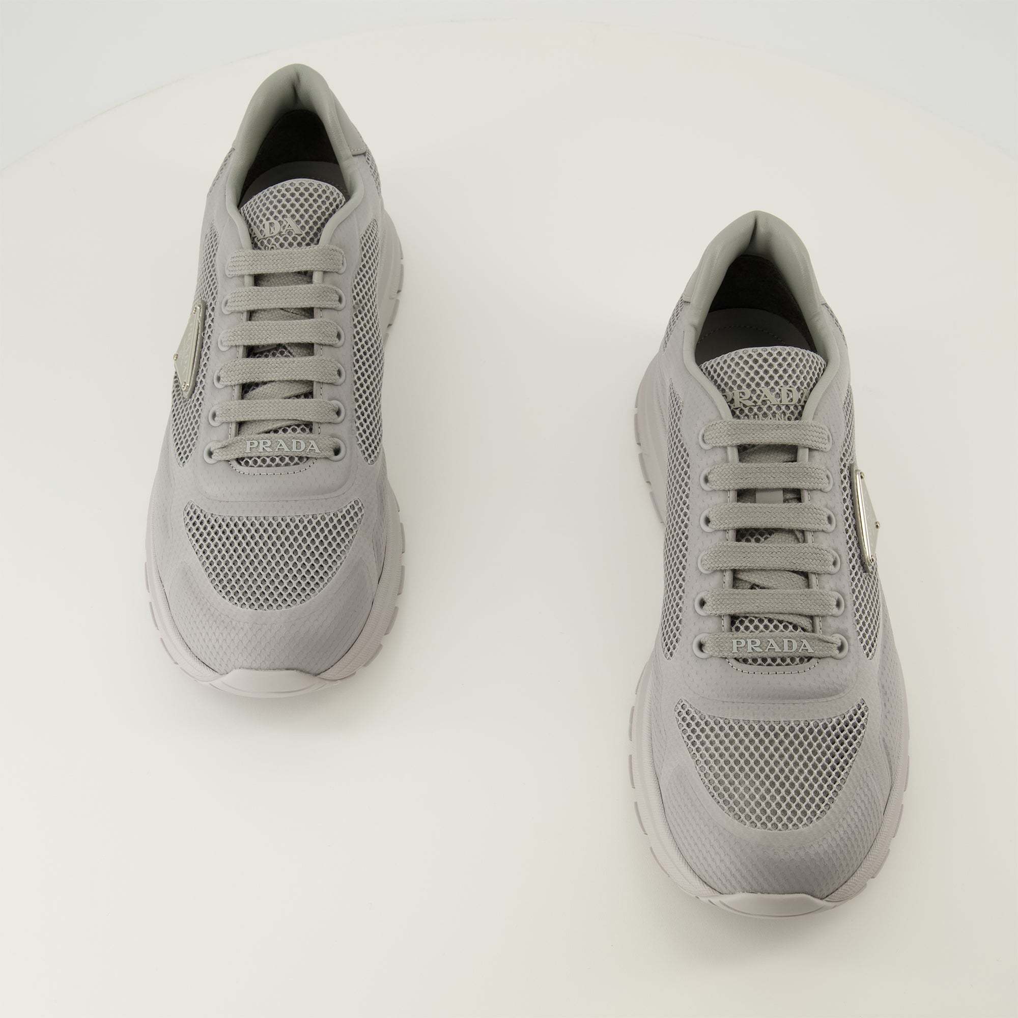 Prada Triangle-logo Lace-up Sneakers In Gray