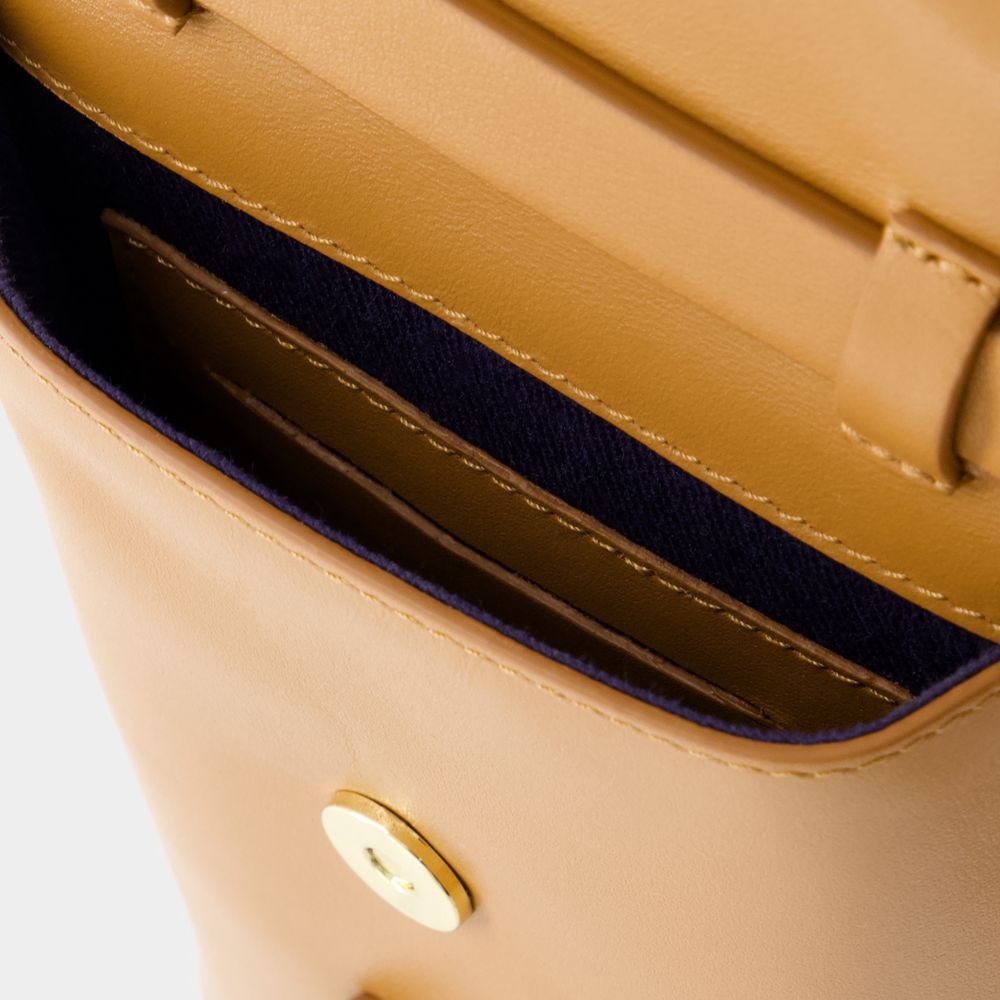 Ines De La Fressange Logo Shoulder Bag In Brown