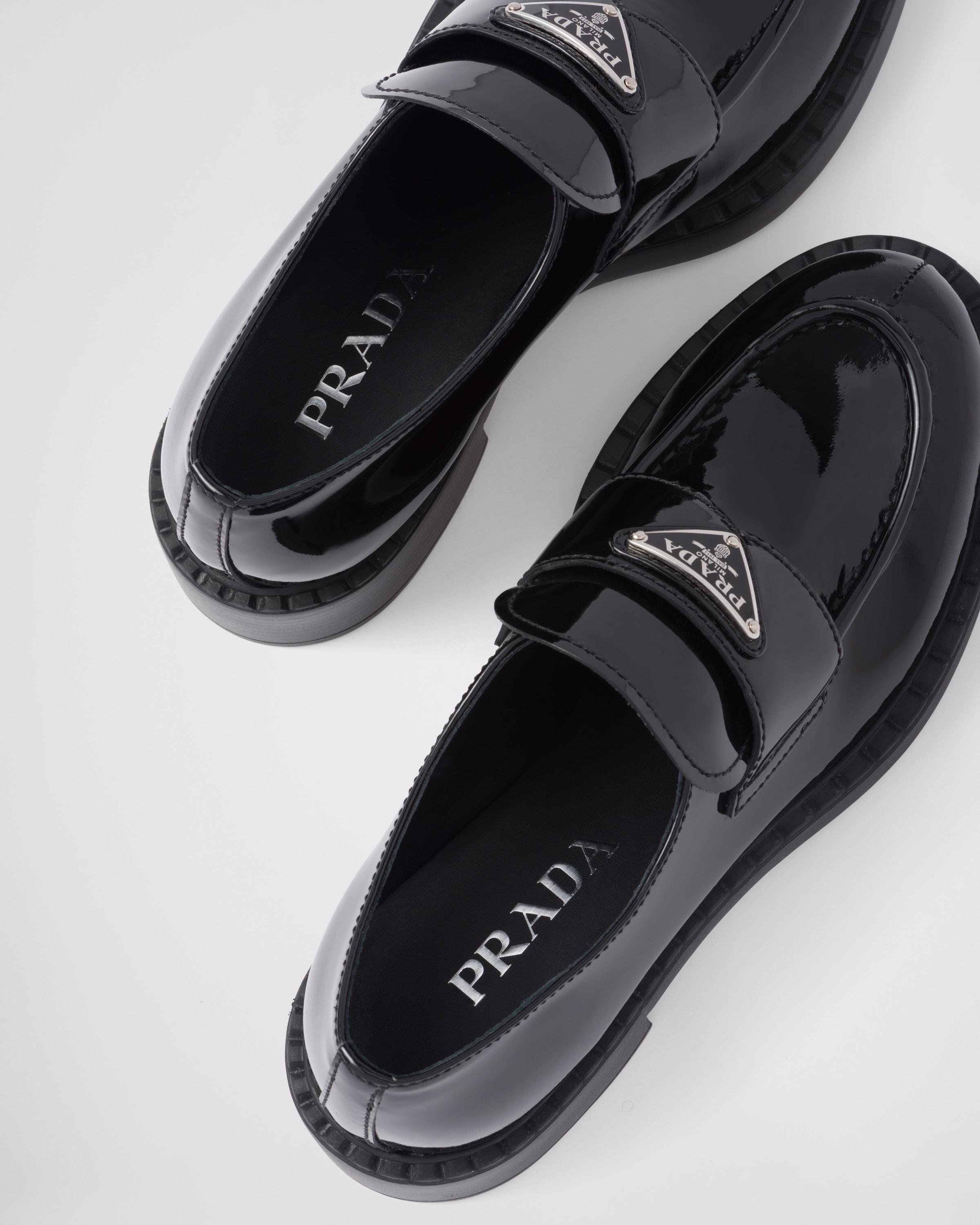 Prada Logo-plaque Leather Loafers In Black