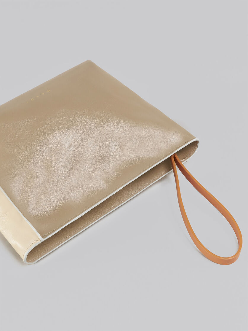 MARNI COLOURBLOCK LOGO-PRINT CLUTCH