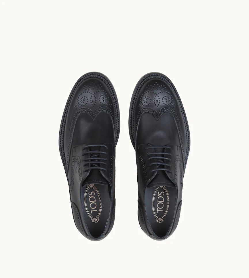 Tod's Wingtip Monogram Brogues In Black