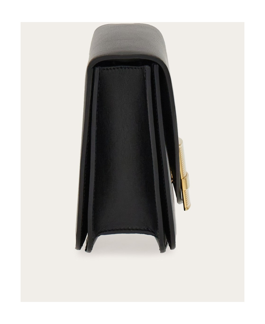 Shop Ferragamo Flip Shoulder Bag In Black