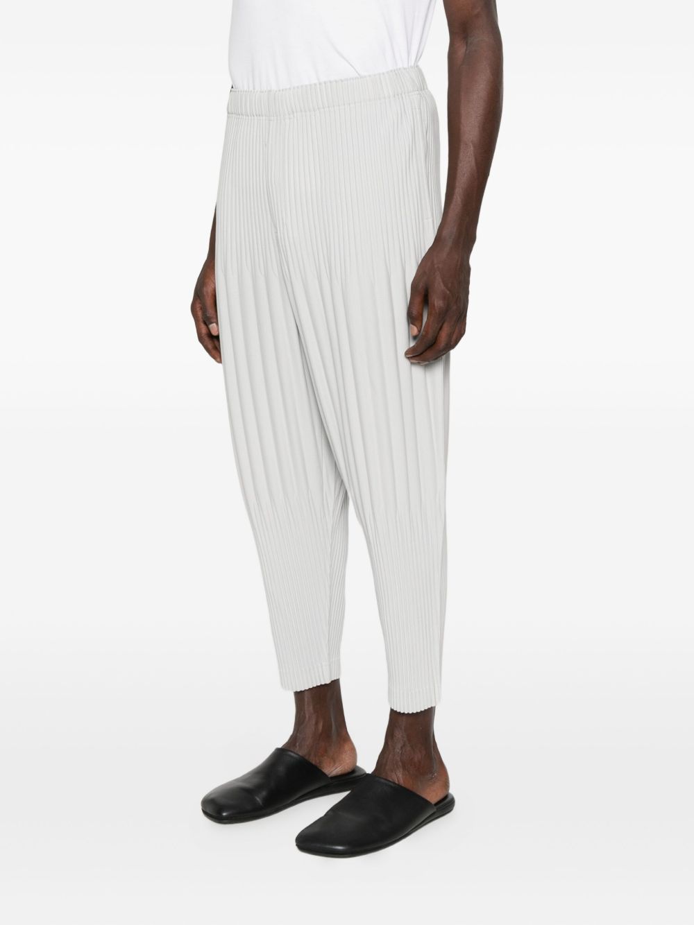 Issey Miyake Basic Pleated Tapered-leg Knitted Trousers In Gray