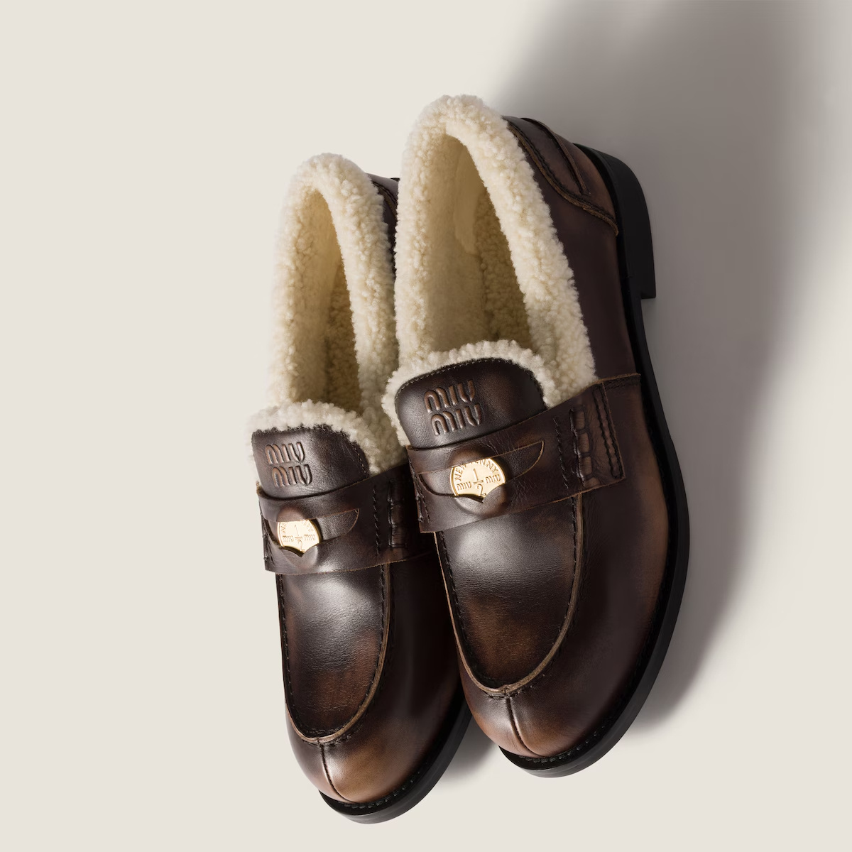 Miu Miu Bleached Leather And Shearling Penny Loafers In Animal Print