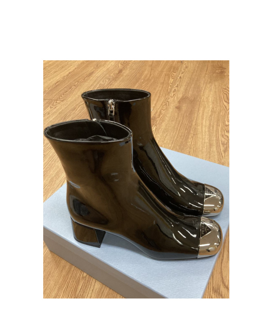 Prada Triangle Logo Plaque Boots In Black