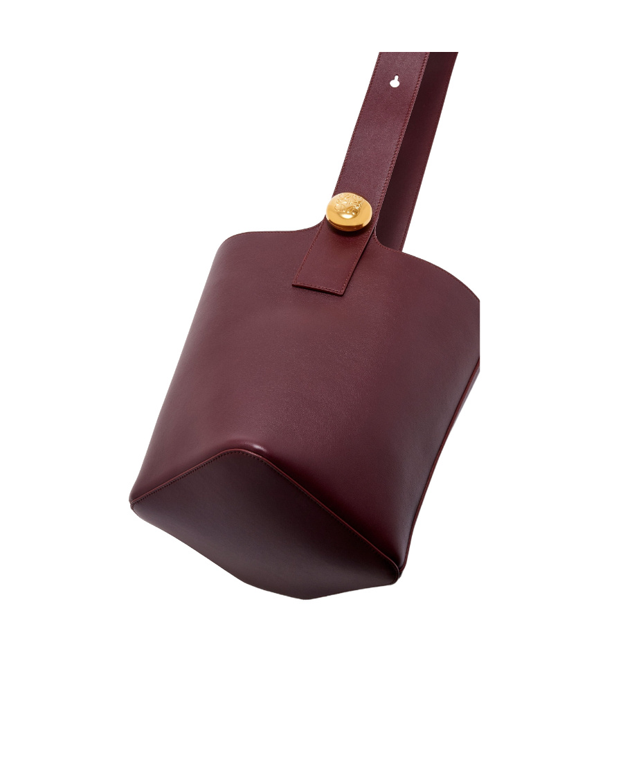 Loewe Medium Pebble Bucket Bag In Mellow Calfskin In Red