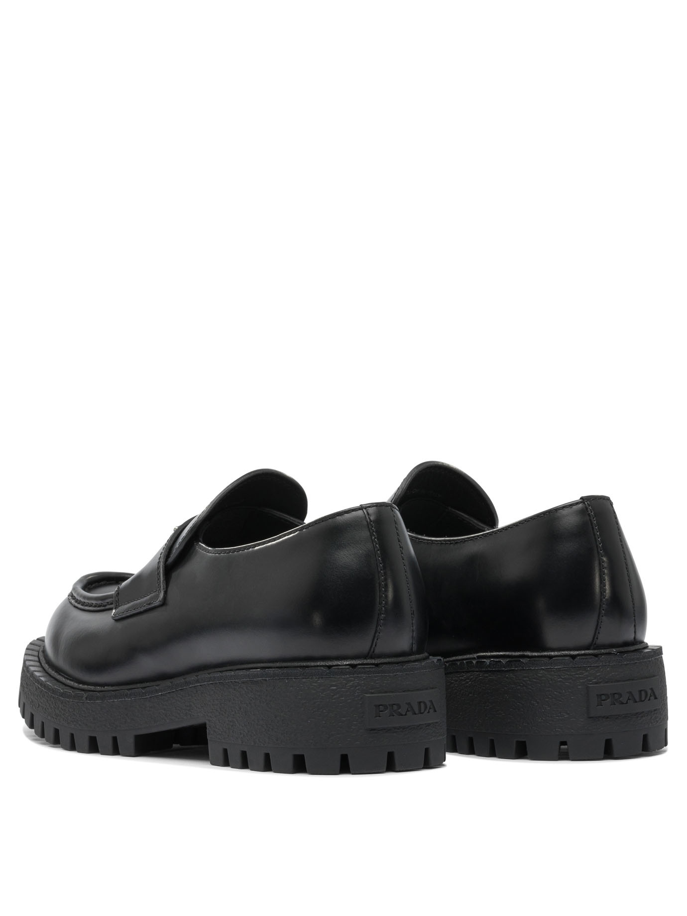 Prada Polished Black Leather Loafers With Chunky Rubber Sole