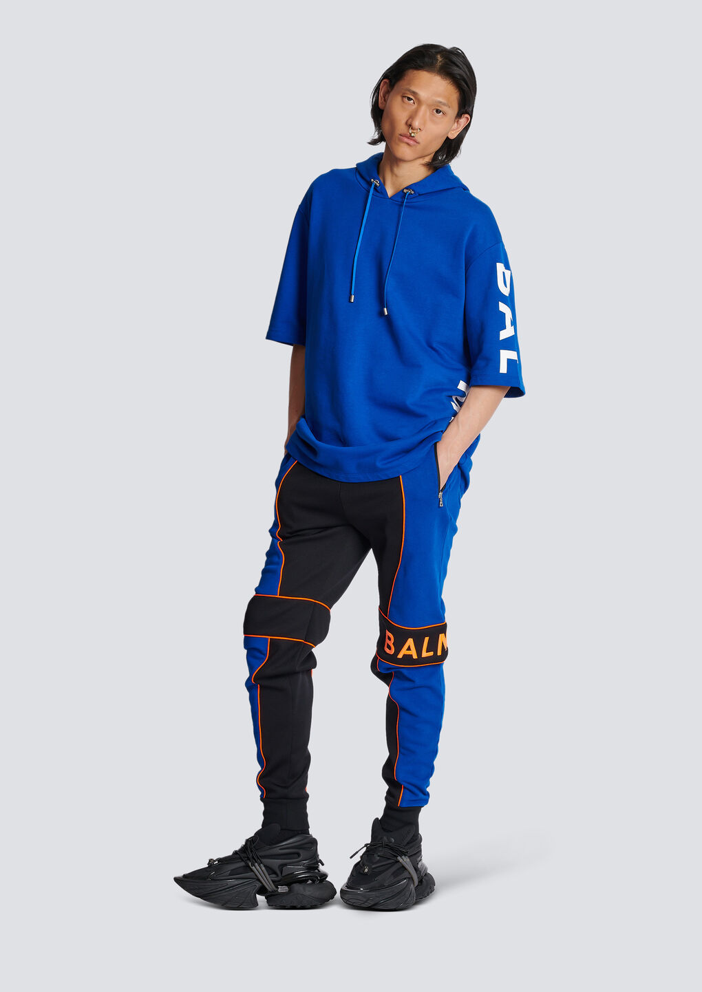 Shop Balmain Jogging Bottoms With  Logo Inserts In Black