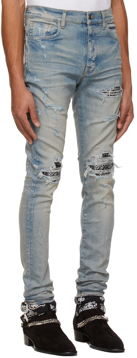 AMIRI MX1 RIPPED SKINNY JEANS