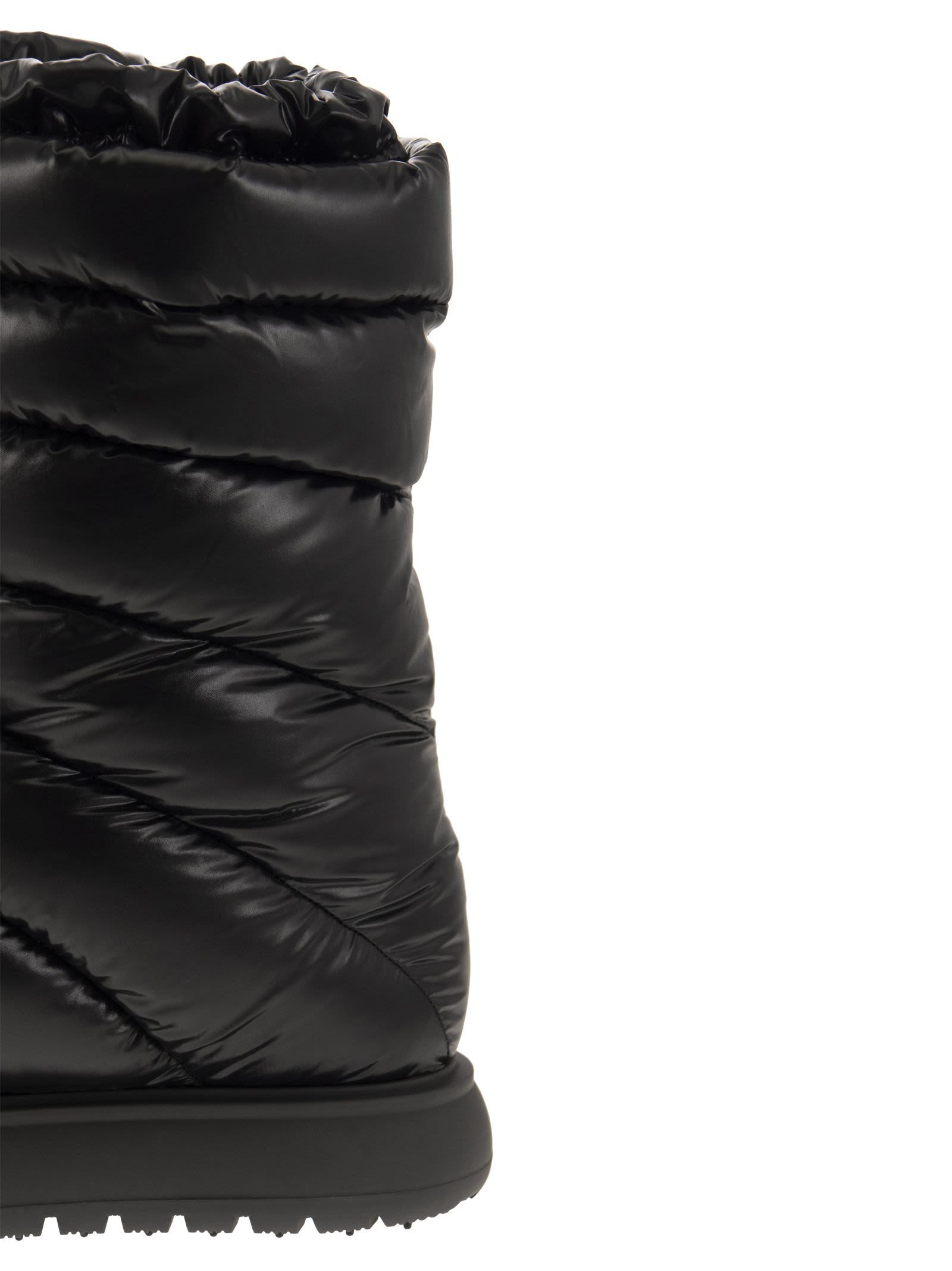 Shop Moncler Logo Motif Patch Puffer Boots In Black