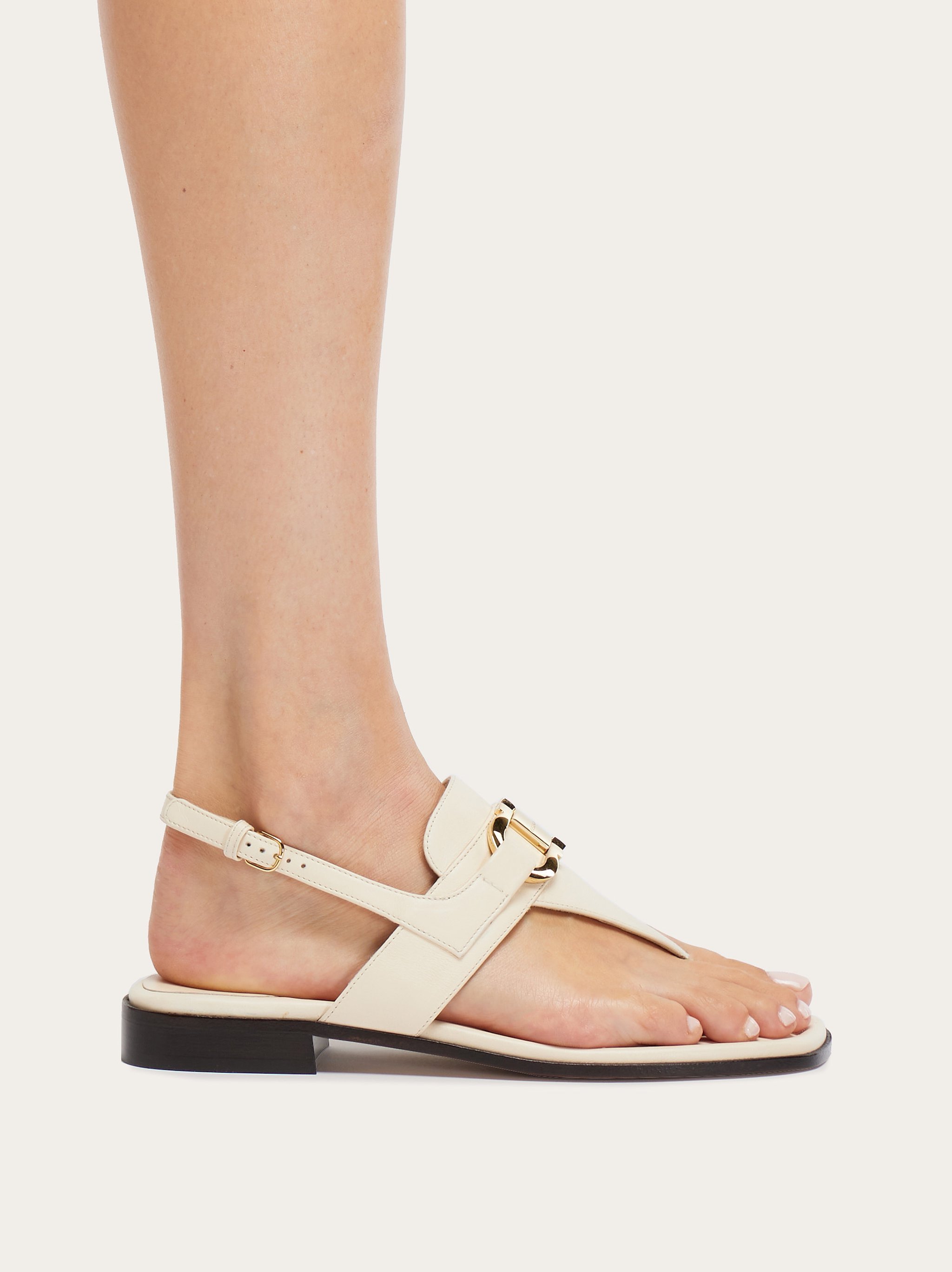 Ferragamo Ivory Gancini Ornament Thong Sandal In Nude