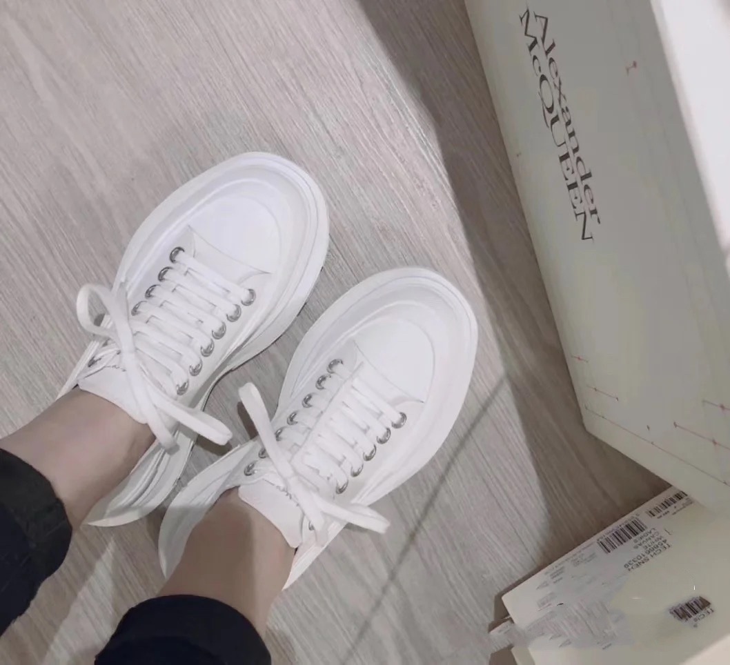 Shop Alexander Mcqueen Tread Slick Low-top Sneakers In White