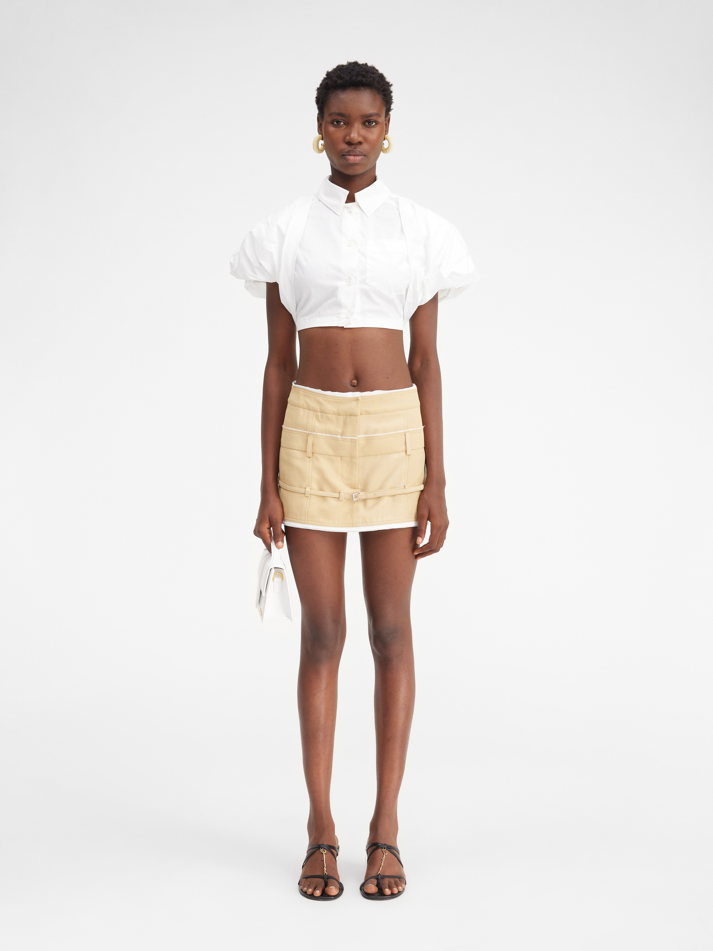 Jacquemus Caraco Buckled Layered Woven Mini Skirt In Nude