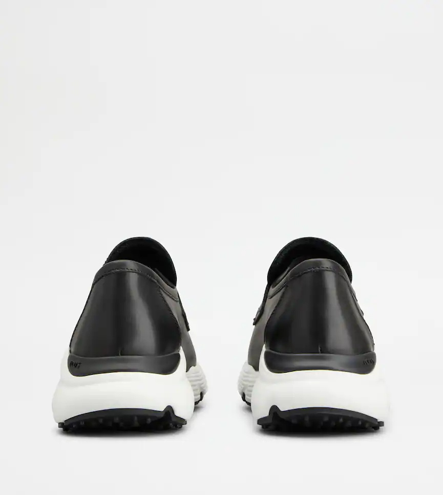 Tod's Leather Penny-slot Sneakers In Black