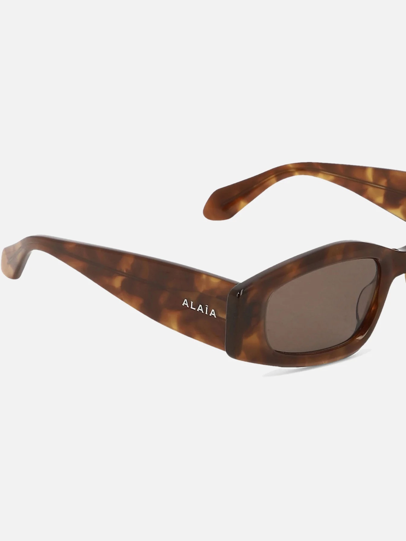 Shop Alaïa Geometric Sunglasses In Brown