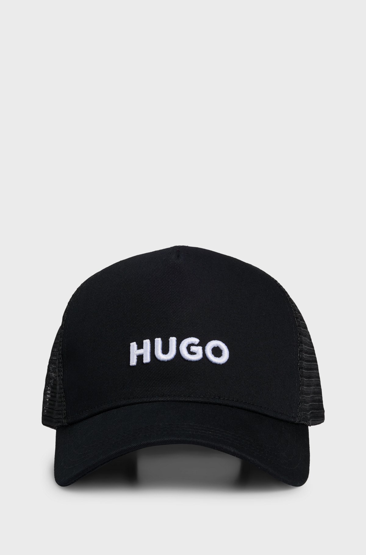 Hugo Boss Embossed Embroidered Logo Trucker Cap In Black