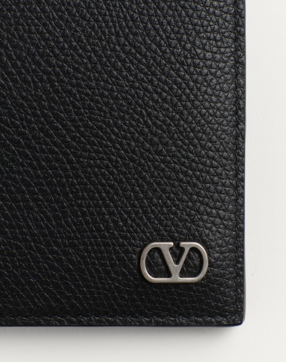 Valentino Garavani Textured Leather Wallet With Subtle Logo Detail In Black