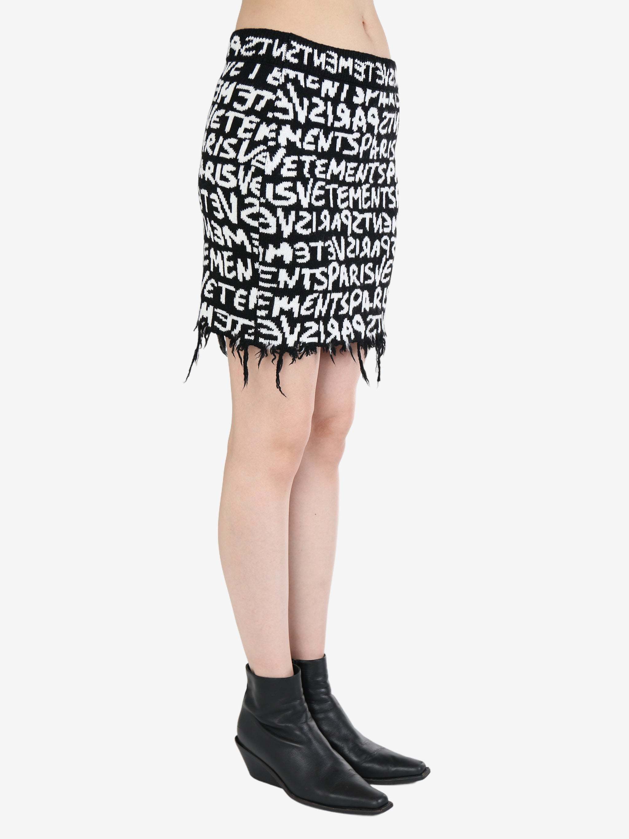 Vetements Paris Monogram High-waisted Mini Skirt In Black