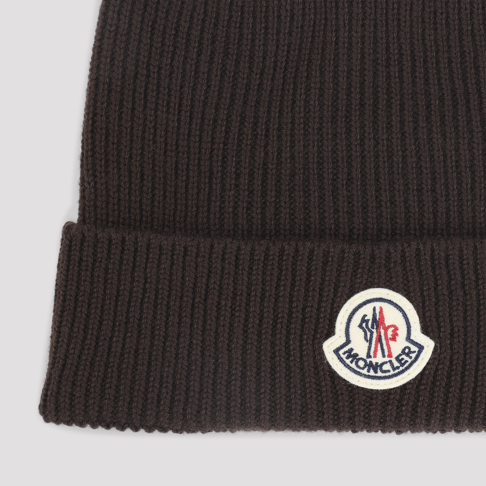 Moncler Wool Hat With Ribbed Texture And Cuff In Black