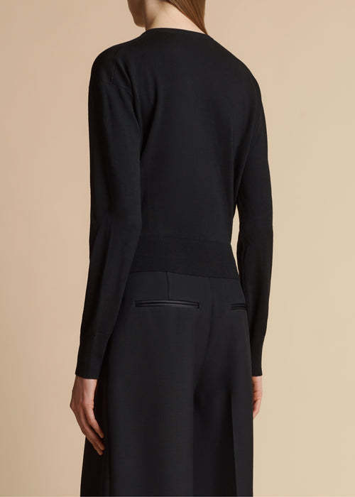 Khaite Long-sleeved Knitted Cardigan In Black