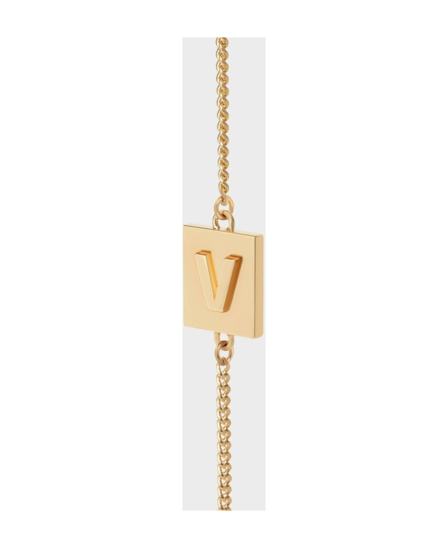Celine Gold Decorated Brass Letter V Bracelet In Yellow