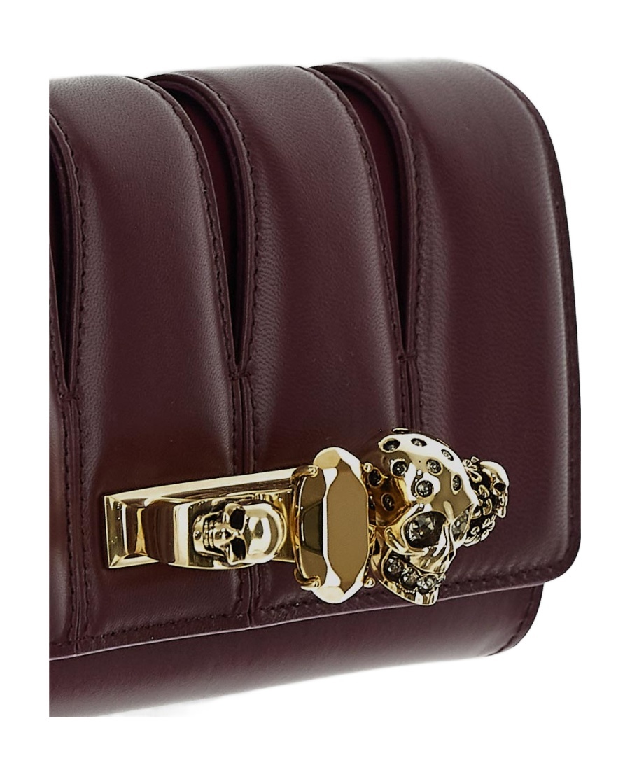 Alexander Mcqueen Skull Quilted Clutch Bag In Red