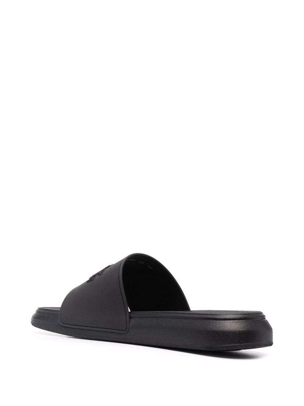 Alexander Mcqueen Logo-embossed Slides In Black