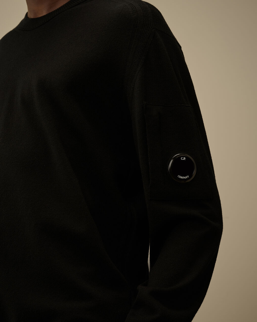 C.p. Company Merino Wool Crewneck Sweater Featuring Pockets In Black