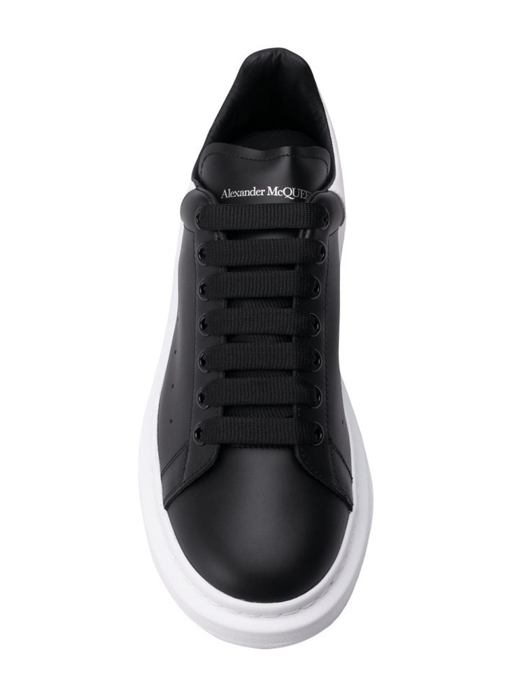Alexander Mcqueen Black Low Top Sneakers With Logo Lettering On The Tongue In Leather Man