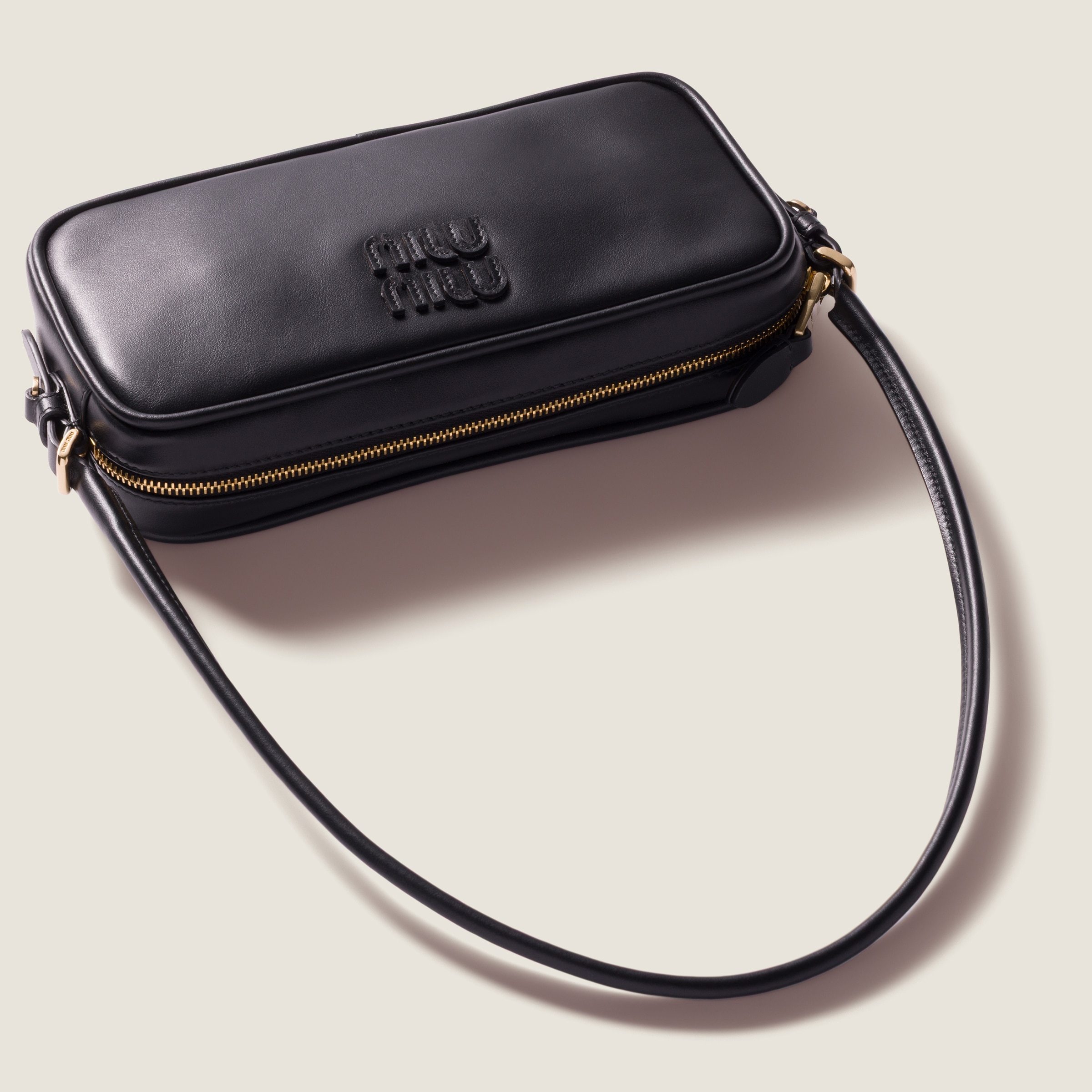 Miu Miu Leather Logo-detail Mini Bag In Black
