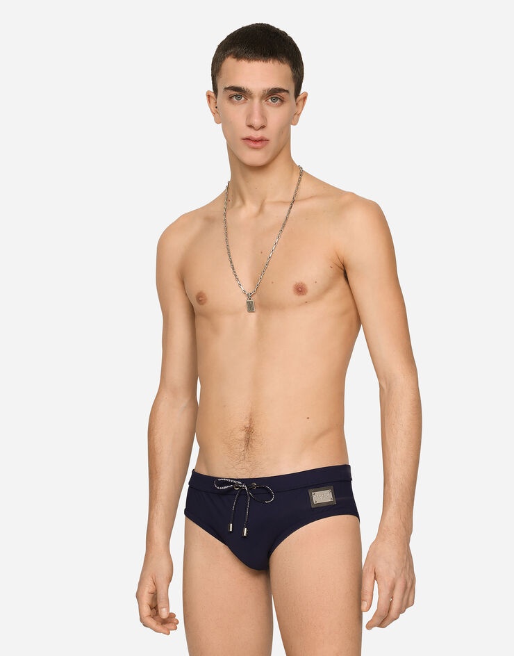 Dolce & Gabbana Swim Briefs With High-cut Leg And Branded Plate In Black