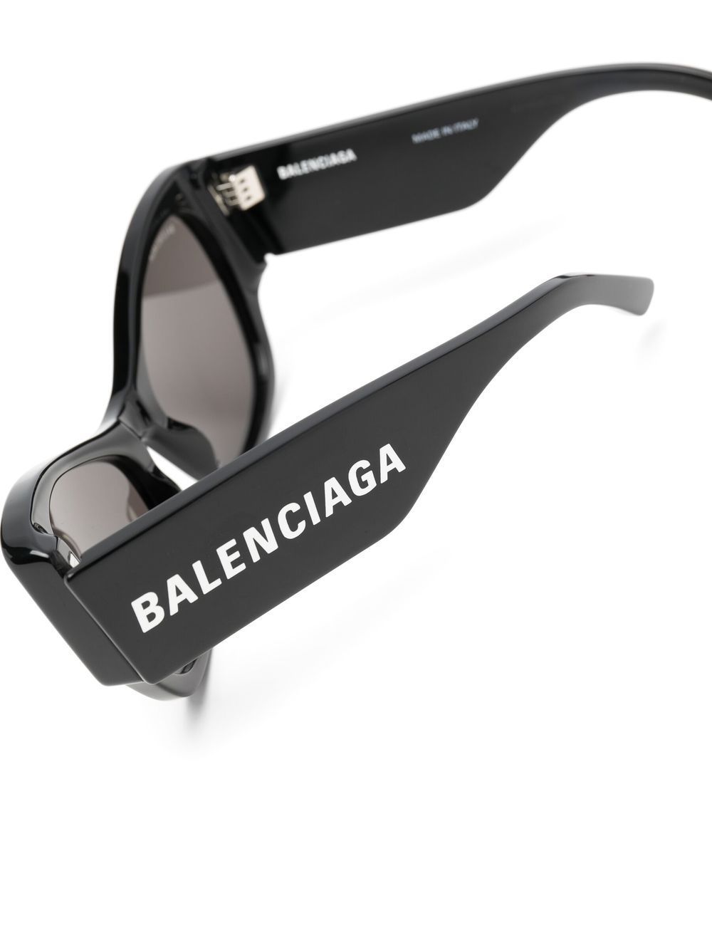 Shop Balenciaga Cat-eye Logo Sunglasses In Black