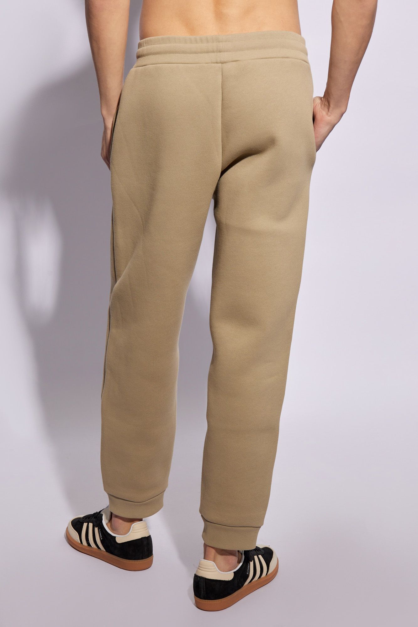 Shop Ami Alexandre Mattiussi Ami Logo Embossed Drawstring Track Pants In Nude