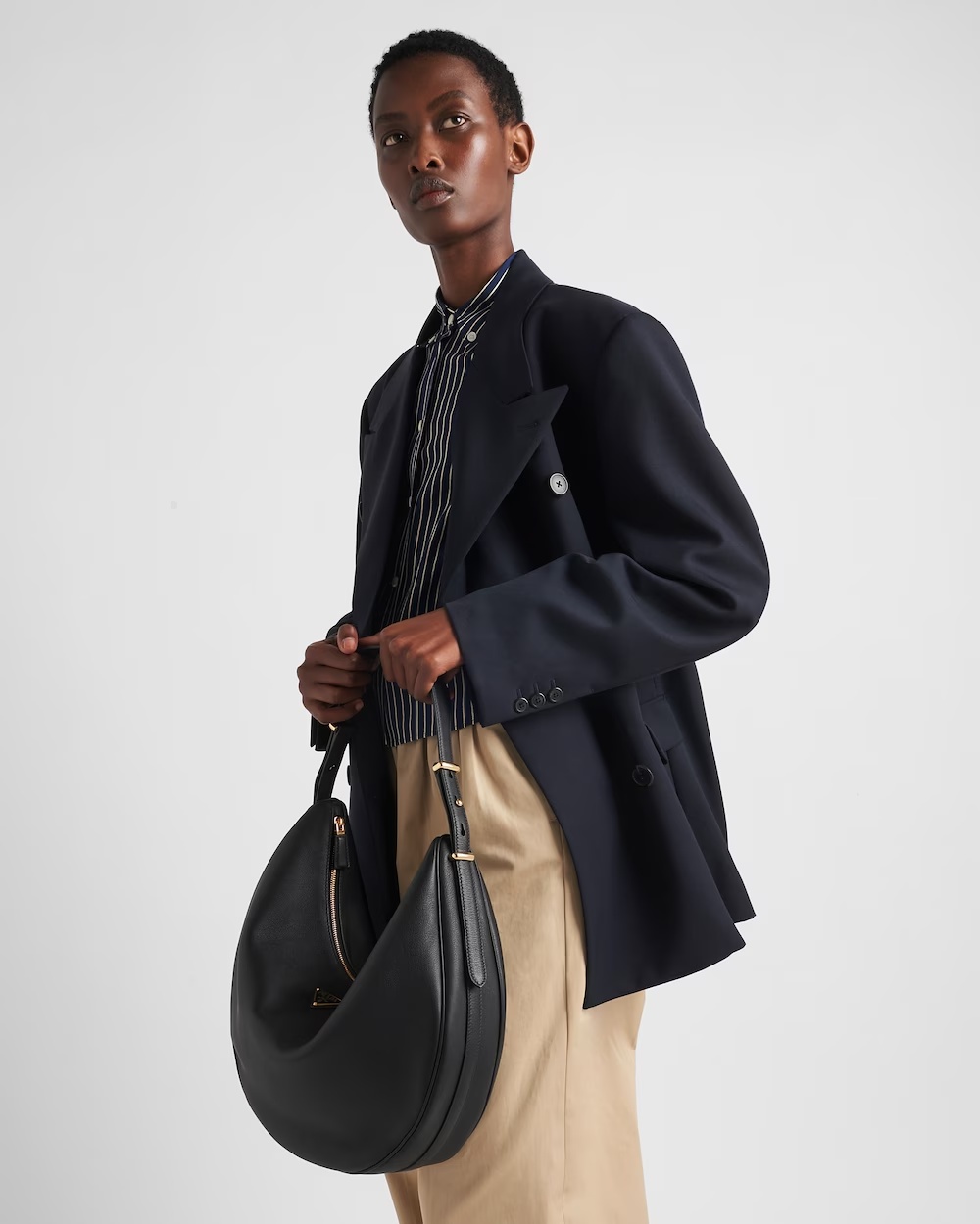 Prada Rounded Shoulder Bag With Gold-tone Hardware In Black