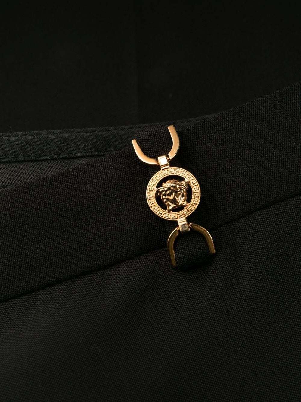 Versace Black Flared Tailored Low Waisted Pants In Stretch Wool Woman