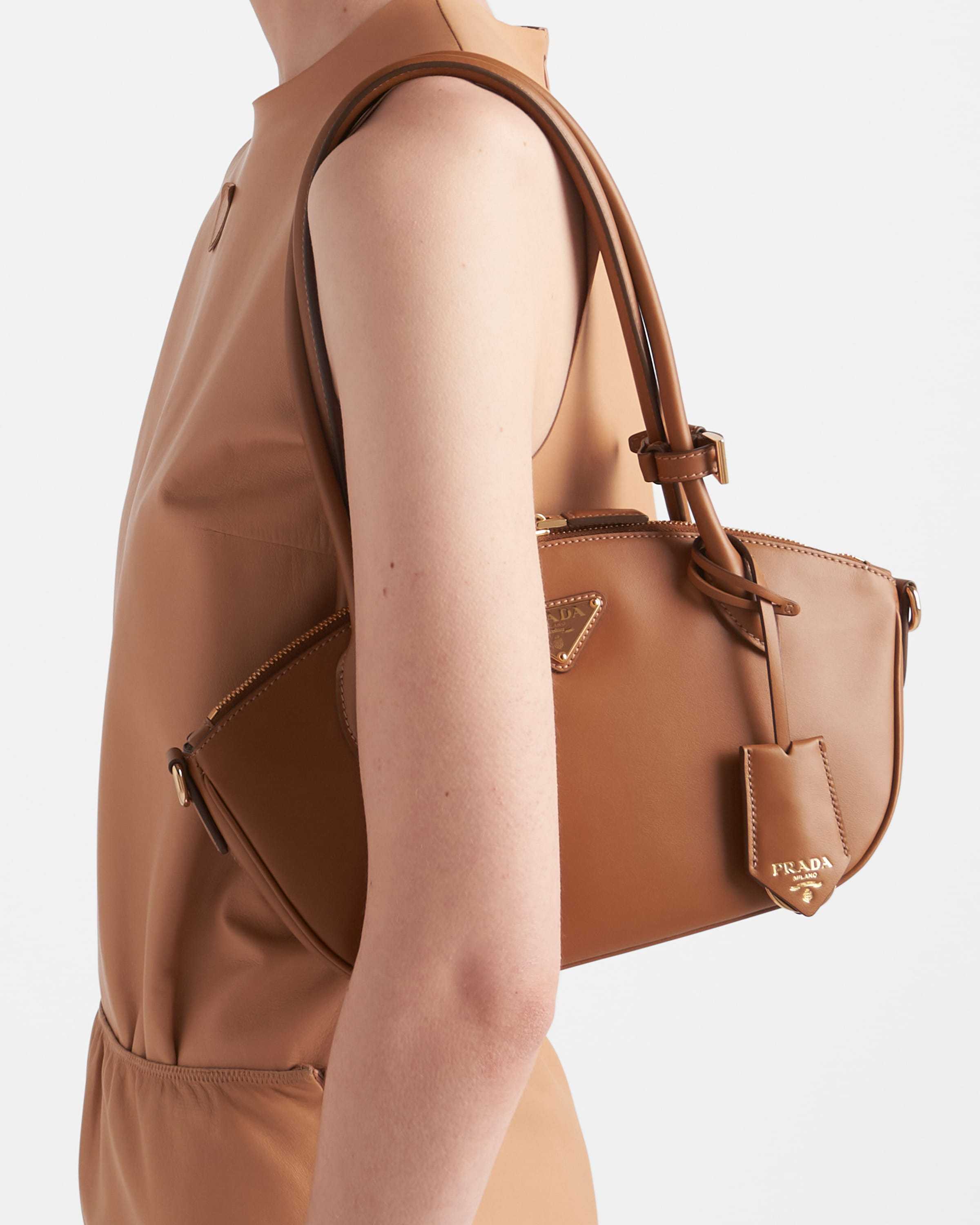 Prada Re-nylon And Leather Medium Top-handle Bag With Padlock In Brown