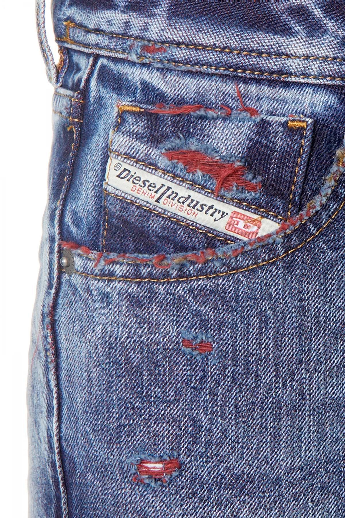 Shop Diesel 1969 Ebbey Bootcut Flared Jeans In Blue