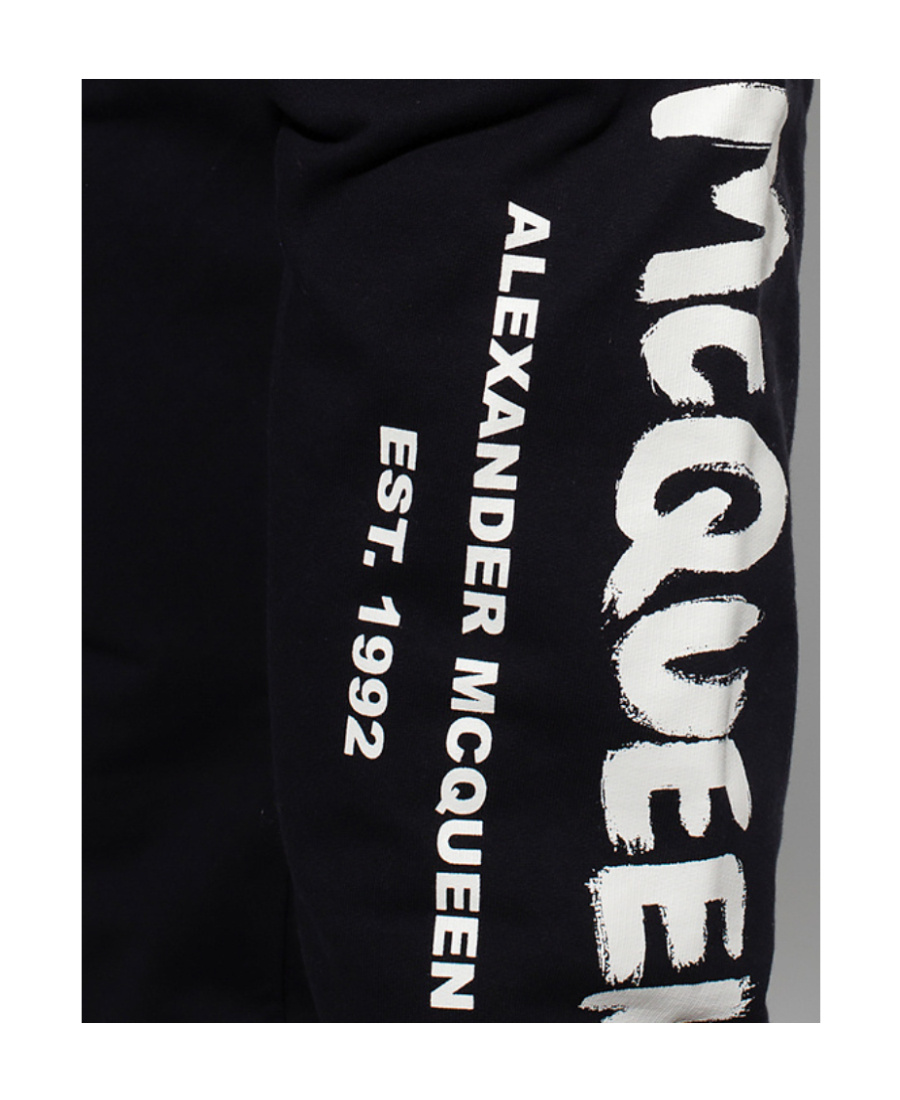 Alexander Mcqueen Logo Graffiti Print Track Pants In Black