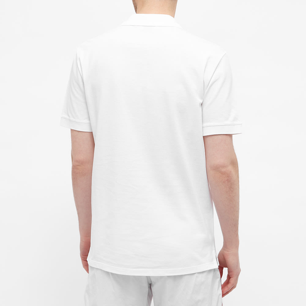 Alexander Mcqueen Graffiti Logo Printed Polo Shirt In White