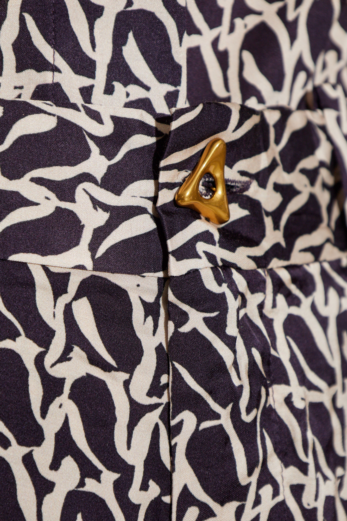 Shop Aeron Wellen Monogram-print Trousers In Black
